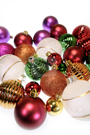 To use this stock image in your creative project, please select the size you need over to the right and click the "Add to Cart" button.
Your downloaded image will come with the Cutcaster watermark removed so don’t worry about the watermark you see on this page. Baubles stock photo, Closeup of colorful baubles by Les Cunliffe