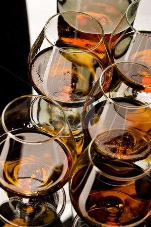 To use this stock image in your creative project, please select the size you need over to the right and click the "Add to Cart" button.
Your downloaded image will come with the Cutcaster watermark removed so don’t worry about the watermark you see on this page. Glasses of cognac stock photo, Drink series: glass of strong cognac over white by Gennady Kravetsky