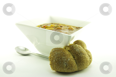 To use this stock image in your creative project, please select the size you need over to the right and click the "Add to Cart" button.
Your downloaded image will come with the Cutcaster watermark removed so don’t worry about the watermark you see on this page. Soup in a White Bowl stock photo, Hot chunky vegetable soup in a small square white bowl with a bread bun and a spoon on a white background by Keith Wilson