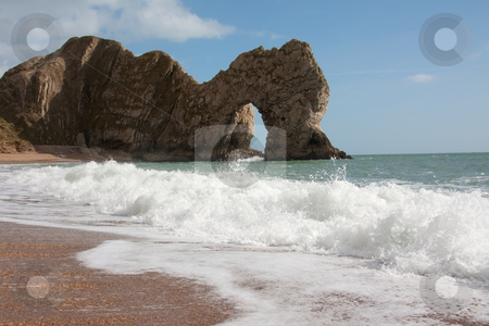To use this stock image in your creative project, please select the size you need over to the right and click the "Add to Cart" button.
Your downloaded image will come with the Cutcaster watermark removed so don’t worry about the watermark you see on this page. Durdle Door stock photo, Durdle Door arch in Dorset, UK by Simon Greig