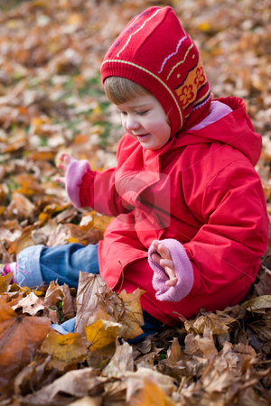 To use this stock image in your creative project, please select the size you need over to the right and click the "Add to Cart" button.
Your downloaded image will come with the Cutcaster watermark removed so don’t worry about the watermark you see on this page. Golden autumn stock photo, People series: little girl play with leaf by Gennady Kravetsky