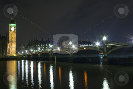 To use this stock image in your creative project, please select the size you need over to the right and click the "Add to Cart" button.
Your downloaded image will come with the Cutcaster watermark removed so don’t worry about the watermark you see on this page. The Big Ben and Westminster Bridge at night stock photo, The Big Ben and Westminster Bridge at night with reflections in the river Thames by Karel Miragaya