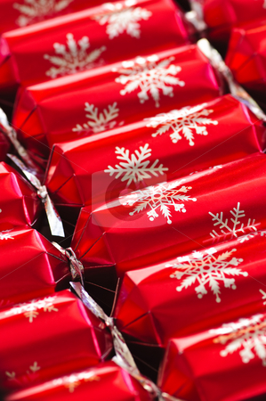 Christmas crackers Christmas crackers stock photo, Closeup of many red Christmas crackers in a row by Elena Elisseeva