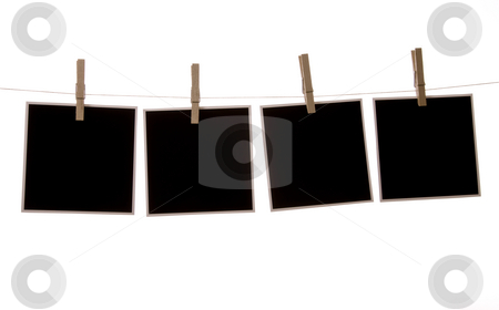 To use this stock image in your creative project, please select the size you need over to the right and click the "Add to Cart" button.
Your downloaded image will come with the Cutcaster watermark removed so don’t worry about the watermark you see on this page. Polaroid stock photo, Photographs in front of a white background, hanging from clothes line. by Jandrie Lombard
