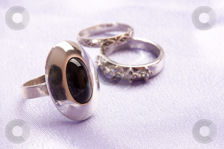 To use this stock image in your creative project, please select the size you need over to the right and click the "Add to Cart" button.
Your downloaded image will come with the Cutcaster watermark removed so don’t worry about the watermark you see on this page. Ring stock photo, Fashion series: black ston in the ring, female accessories by Gennady Kravetsky
