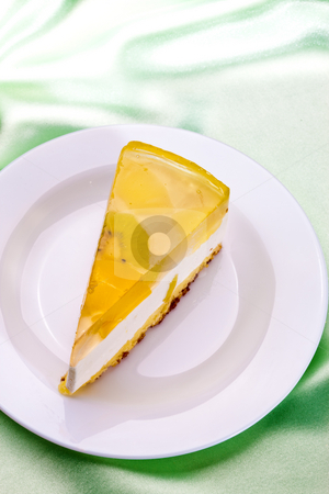 To use this stock image in your creative project, please select the size you need over to the right and click the "Add to Cart" button.
Your downloaded image will come with the Cutcaster watermark removed so don’t worry about the watermark you see on this page. Tart stock photo, Food series: fancy cake with yellow fruit jelly by Gennady Kravetsky