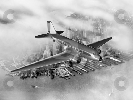To use this stock image in your creative project, please select the size you need over to the right and click the "Add to Cart" button.
Your downloaded image will come with the Cutcaster watermark removed so don’t worry about the watermark you see on this page. DC-3 Over NYC stock photo, Vintage image of a Douglas DC-3 over New York City by James Steidl