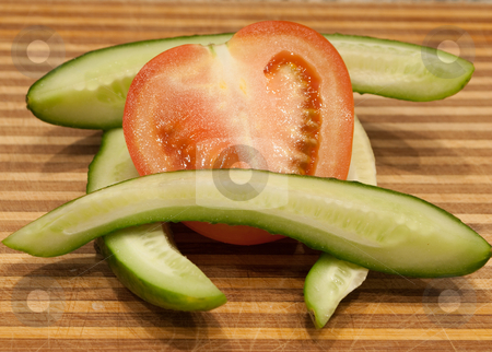 To use this stock image in your creative project, please select the size you need over to the right and click the "Add to Cart" button.
Your downloaded image will come with the Cutcaster watermark removed so don’t worry about the watermark you see on this page. Vegetable on a table stock photo, by Ilya Kapustnikow