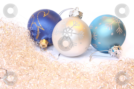 To use this stock image in your creative project, please select the size you need over to the right and click the "Add to Cart" button.
Your downloaded image will come with the Cutcaster watermark removed so don’t worry about the watermark you see on this page. Christmas balls and a tinsel stock photo, Three Christmas balls and golden tinsel. Isolated on white by Olga Lipatova