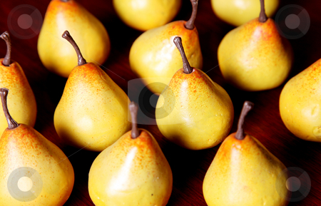 Pears Pears stock photo, Several yellow pears on a wooden surface by Giuseppe Ramos