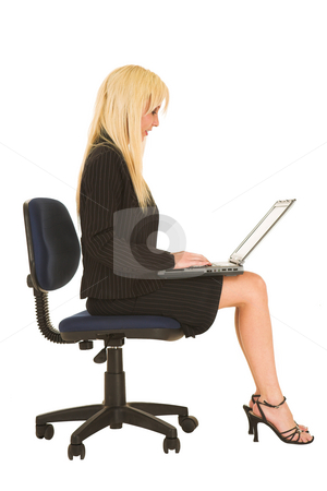 To use this stock image in your creative project, please select the size you need over to the right and click the "Add to Cart" button.
Your downloaded image will come with the Cutcaster watermark removed so don’t worry about the watermark you see on this page. Business Woman in black #133 stock photo, Blond business woman in black dress business suit, sitting down, with notebook computer on her lap by Sean Nel
