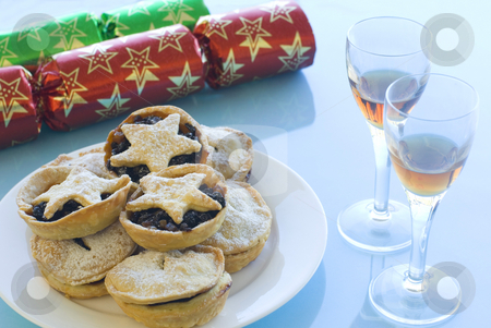 To use this stock image in your creative project, please select the size you need over to the right and click the "Add to Cart" button.
Your downloaded image will come with the Cutcaster watermark removed so don’t worry about the watermark you see on this page. Mince pies and Sherry stock photo, A Christmas still life with mince pies, glasses of sherry and crackers by Stephen Gibson
