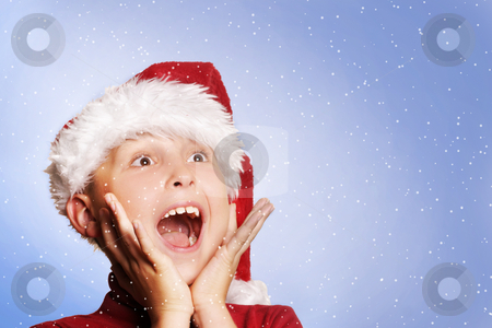 To use this stock image in your creative project, please select the size you need over to the right and click the "Add to Cart" button.
Your downloaded image will come with the Cutcaster watermark removed so don’t worry about the watermark you see on this page. White Christmas stock photo, Excited young boy amongst snowflakes. by Leah-Anne Thompson