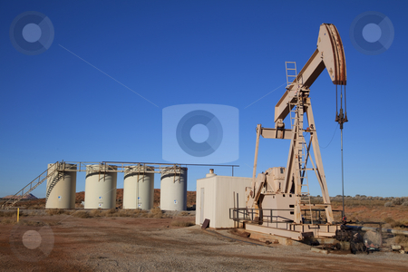 Oil Well Oil Well stock photo, Oil well with Storage Tanks in the tackground by Mark Smith
