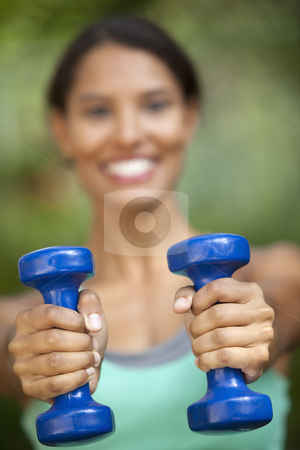 Young Woman Exercising Young Woman Exercising stock photo, Young woman exercising in outdoor setting. Vertically framed shot. by Edward Bock
