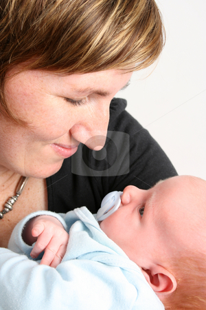 To use this stock image in your creative project, please select the size you need over to the right and click the "Add to Cart" button.
Your downloaded image will come with the Cutcaster watermark removed so don’t worry about the watermark you see on this page. Mother and Son stock photo, Loving mother holding her new baby boy by Vanessa Van Rensburg