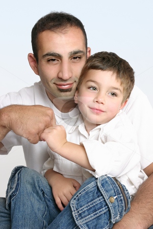 To use this stock image in your creative project, please select the size you need over to the right and click the "Add to Cart" button.
Your downloaded image will come with the Cutcaster watermark removed so don’t worry about the watermark you see on this page. Father and son best mates stock photo, Father and son make a friendly pact. by Leah-Anne Thompson