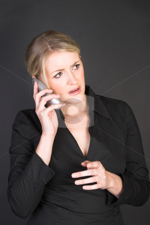 To use this stock image in your creative project, please select the size you need over to the right and click the "Add to Cart" button.
Your downloaded image will come with the Cutcaster watermark removed so don’t worry about the watermark you see on this page. Beautiful Businesswoman stock photo, Worried looking blond businesswoman in conversation on the phone by Carla Booysen