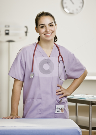 To use this stock image in your creative project, please select the size you need over to the right and click the "Add to Cart" button.
Your downloaded image will come with the Cutcaster watermark removed so don’t worry about the watermark you see on this page. Young Female Medical Professional stock photo, Young female medical professional in examination room. Vertically framed shot. by Jonathan Ross