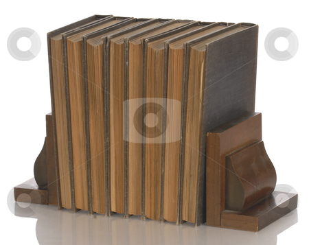 Vintage books and bookends Vintage books and bookends stock photo, Old books held up with wooden bookends with reflection on white background by John McAllister