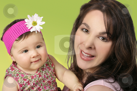 To use this stock image in your creative project, please select the size you need over to the right and click the "Add to Cart" button.
Your downloaded image will come with the Cutcaster watermark removed so don’t worry about the watermark you see on this page. Mother and Daughter stock photo, Mother with her baby daughter. by Leah-Anne Thompson