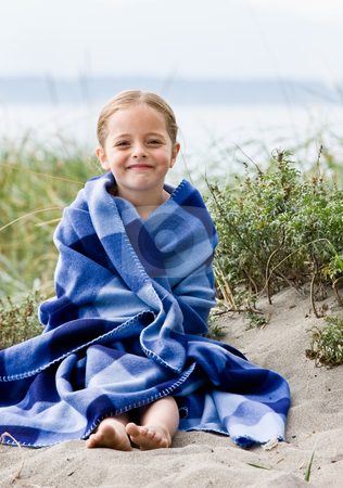 Girl wrapped in blanket at beach Girl wrapped in blanket at beach stock photo, Girl wrapped in blanket at beach by Jonathan Ross