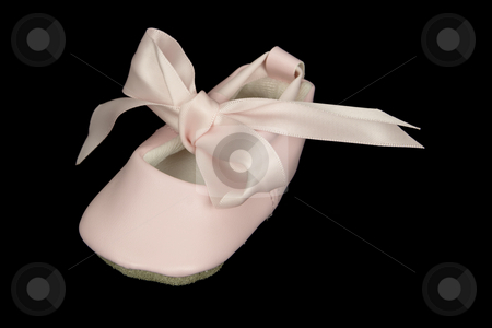 Baby Ballet Shoe Baby Ballet Shoe stock photo, Pink baby ballet shoe photographed against a black background for isolation purposes. by Inge Schepers