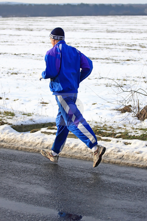 Senior runner Senior runner stock photo, Senior runner while training for a competition in winter by ARPAD RADOCZY