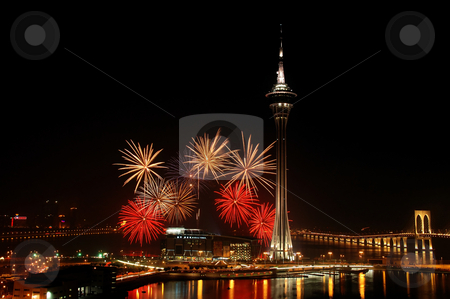 To use this stock image in your creative project, please select the size you need over to the right and click the "Add to Cart" button.
Your downloaded image will come with the Cutcaster watermark removed so don’t worry about the watermark you see on this page. Celebration of New Year stock photo, Celebration of New Year in Macau with fireworks beside the Tower Convention and Entertainment Center by Tito Wong