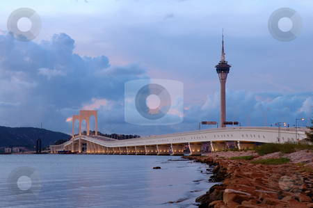 To use this stock image in your creative project, please select the size you need over to the right and click the "Add to Cart" button.
Your downloaded image will come with the Cutcaster watermark removed so don’t worry about the watermark you see on this page. Bridge and tower stock photo, The picture of bridge and tower of Macau by Tito Wong