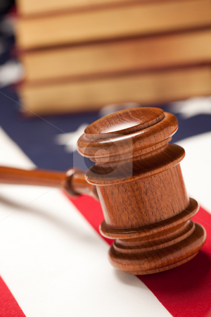 To use this stock image in your creative project, please select the size you need over to the right and click the "Add to Cart" button.
Your downloaded image will come with the Cutcaster watermark removed so don’t worry about the watermark you see on this page. Gavel and Books on Flag stock photo, Gavel and Books on the American Flag with Selective Focus. by Andy Dean
