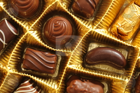 To use this stock image in your creative project, please select the size you need over to the right and click the "Add to Cart" button.
Your downloaded image will come with the Cutcaster watermark removed so don’t worry about the watermark you see on this page. Exclusive chocolate stock photo, Exclusive chocolate in showing love or food concept by Gunnar Pippel
