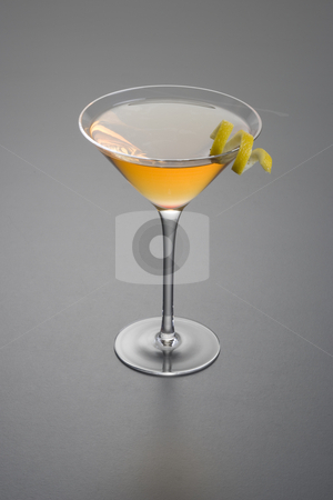 To use this stock image in your creative project, please select the size you need over to the right and click the "Add to Cart" button.
Your downloaded image will come with the Cutcaster watermark removed so don’t worry about the watermark you see on this page. Dry Rob Roy or Manhattan cocktail stock photo, Manhattan cocktail with lemon peel garnish close up on grey background by Gabe Palmer