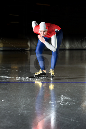 Speed skater at the starting line Speed skater at the starting line stock photo, Speed skater at the starting line of a long distance race in an indoor ice rink by Corepics VOF