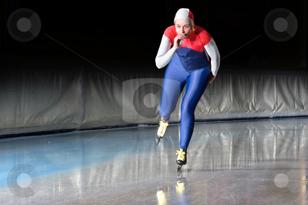 To use this stock image in your creative project, please select the size you need over to the right and click the "Add to Cart" button.
Your downloaded image will come with the Cutcaster watermark removed so don’t worry about the watermark you see on this page. Speed skater at speed stock photo, Speed skater emerging on the straight stretch of an indoor ice rink during a long distance skating race by Corepics VOF