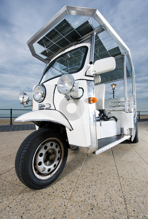 Solar powered tuc tuc Solar powered tuc tuc stock photo, Solar powered tuc tuc on the boulevard near the beach by Corepics VOF