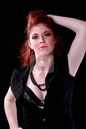 Young redhead woman with shirt open showing bra Young redhead woman with shirt open showing bra stock photo, Pretty caucasian redhead woman black shirt and bra by Jeff Cleveland