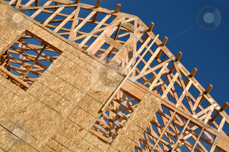 To use this stock image in your creative project, please select the size you need over to the right and click the "Add to Cart" button.
Your downloaded image will come with the Cutcaster watermark removed so don’t worry about the watermark you see on this page. New Home Under Construction stock photo, New Home Under Construction with blue sky by Brandon Bourdages
