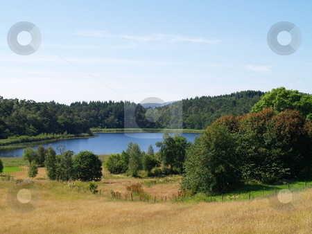 To use this stock image in your creative project, please select the size you need over to the right and click the "Add to Cart" button.
Your downloaded image will come with the Cutcaster watermark removed so don’t worry about the watermark you see on this page. Nature with lake stock photo, by imageoptimistic