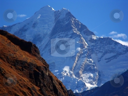 To use this stock image in your creative project, please select the size you need over to the right and click the "Add to Cart" button.
Your downloaded image will come with the Cutcaster watermark removed so don’t worry about the watermark you see on this page. Garhwal Himalayan Peaks from Tapovan stock photo, Garhwal Himalayan Peaks from Tapovan, India by Srijan Roy Choudhury