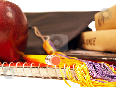 To use this stock image in your creative project, please select the size you need over to the right and click the "Add to Cart" button.
Your downloaded image will come with the Cutcaster watermark removed so don’t worry about the watermark you see on this page. School's out stock photo, An apple, textbooks and a graduation cap on a notebook isolated on white by Christy Thompson