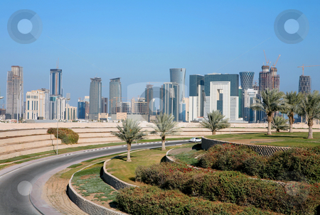 To use this stock image in your creative project, please select the size you need over to the right and click the "Add to Cart" button.
Your downloaded image will come with the Cutcaster watermark removed so don’t worry about the watermark you see on this page. Doha skyline stock photo, A view of the emerging skyline in Doha, the capital city of Qatar, Arabia, seen from inland. by Paul Cowan