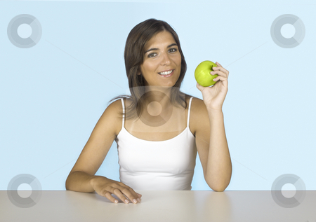 To use this stock image in your creative project, please select the size you need over to the right and click the "Add to Cart" button.
Your downloaded image will come with the Cutcaster watermark removed so don’t worry about the watermark you see on this page. Apple diet stock photo, Beautiful young woman holding a green apple by ikostudio