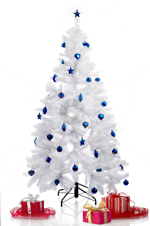 To use this stock image in your creative project, please select the size you need over to the right and click the "Add to Cart" button.
Your downloaded image will come with the Cutcaster watermark removed so don’t worry about the watermark you see on this page. Christmas Tree stock photo, Christmas white tree and gifts over a white background by ikostudio
