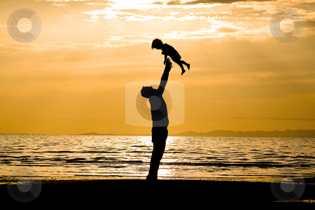 Father and Son Father and Son stock photo, Father and son on the Beach - Silhouette by Mehmet Dilsiz