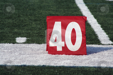 To use this stock image in your creative project, please select the size you need over to the right and click the "Add to Cart" button.
Your downloaded image will come with the Cutcaster watermark removed so don’t worry about the watermark you see on this page. Football forty yard marker stock photo, A red Football forty yard marker by Jim Mills