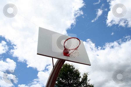 To use this stock image in your creative project, please select the size you need over to the right and click the "Add to Cart" button.
Your downloaded image will come with the Cutcaster watermark removed so don’t worry about the watermark you see on this page. Basketball hoop against sky stock photo, An image of a Basketball hoop against a cloudy sky by Jim Mills