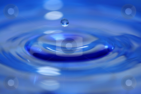 To use this stock image in your creative project, please select the size you need over to the right and click the "Add to Cart" button.
Your downloaded image will come with the Cutcaster watermark removed so don’t worry about the watermark you see on this page. Water droplet stock photo, A Blue water droplet falling by Jim Mills