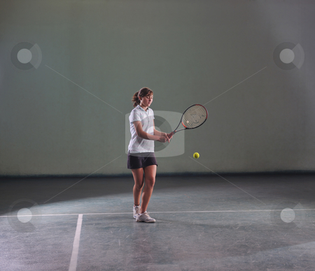 To use this stock image in your creative project, please select the size you need over to the right and click the "Add to Cart" button.
Your downloaded image will come with the Cutcaster watermark removed so don’t worry about the watermark you see on this page. Tennis girl stock photo, Young girl exercise tennis sport indoor by Benis Arapovic