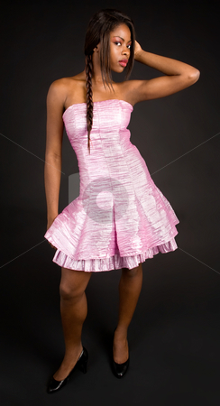 Beautiful African American Lady Looking Sideway Beautiful African American Lady Looking Sideway stock photo, A beautiful young African American lady is looking sideway at the camera. by Denis Pepin